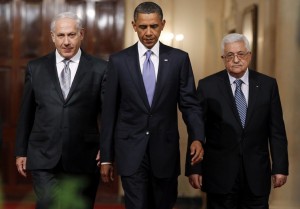 U.S. President Obama walks down Cross Hall with Israeli PM Netanyahu and Palestinian President Abbas to make joint statements at the White House