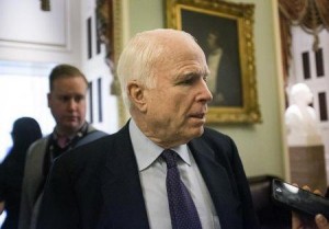 Chairman of the Armed Forces Committee Senator John McCain speaks to reporters on Capitol Hill in Washington