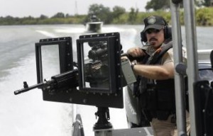 Texas Department of Safety Troopers patrol on the Rio Grande along the U.S.-Mexico border on patrol near Mission